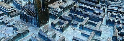 Detailansicht des bronzenen Stadtmodells von Lübeck mit hervorgehobenen Miniatur-Gebäuden und glänzenden Kirchturmspitzen. - zum Artikel 'Mehr erleben in Schleswig-Holsteins Städten'